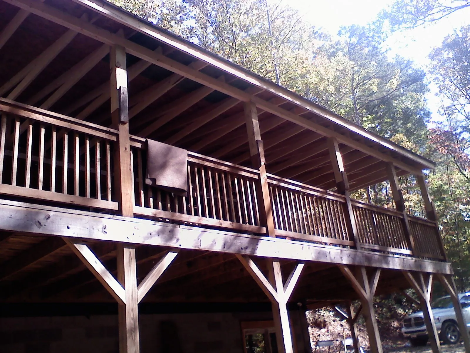 Timber framing under a new elevated porch and deck — Roof Leak Repair in Windsor Heights by Roofing Brothers